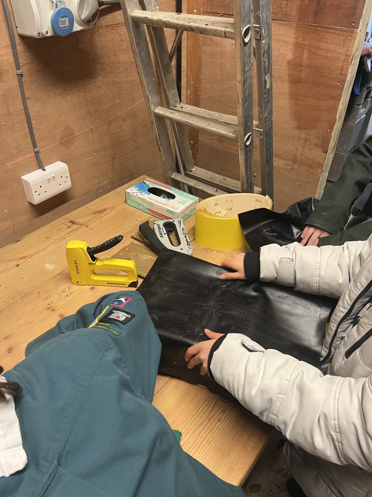 Using pond lining around the boxes to create a water tight micro pond